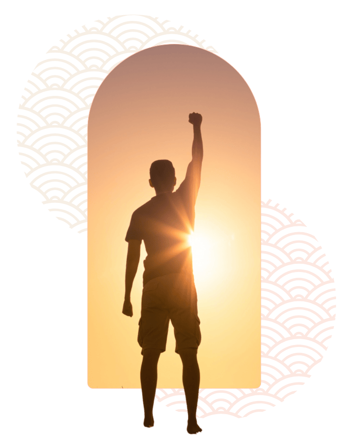 A photo of a man's silhouette against a sunset 