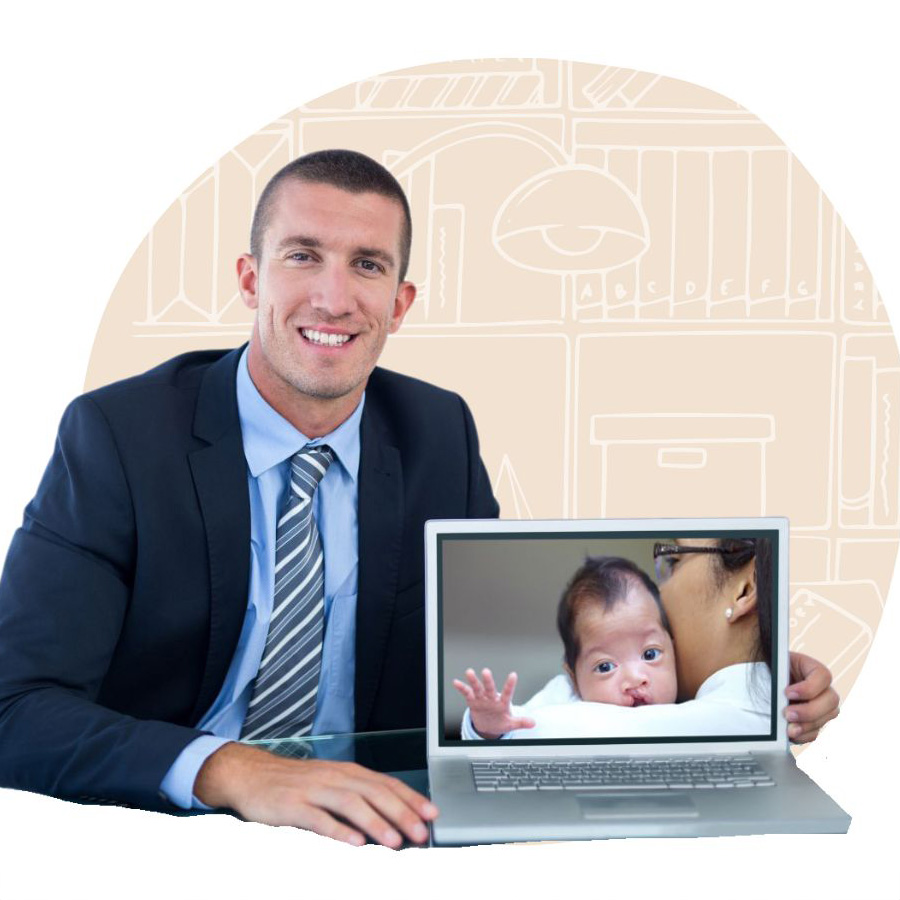 A young man showing his baby photo